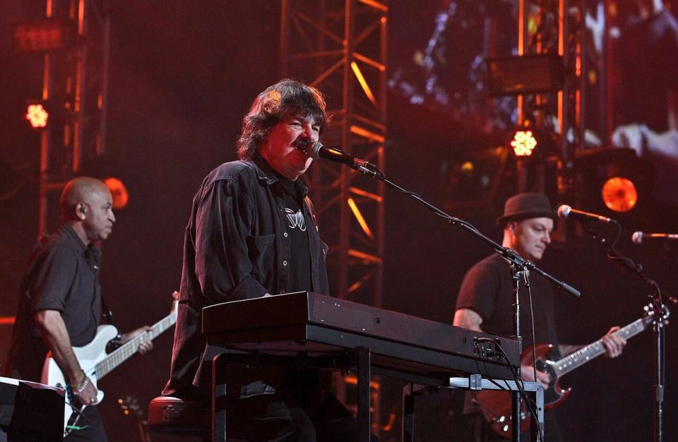 Burton Cummings performs during Manitoba night at BC Place following the medals ceremony at the 2010 Vancouver Winter Olympics. Cummings has terminated performing rights agreements to stop his former Guess Who bandmates from performing songs he wrote. (Tara Walton/The Canadian Press - image credit)