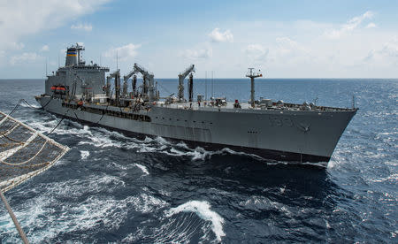 Military Sealift Command fleet replenishment oiler USNS Walter S. Diehl (T-AO 193) pulls alongside hospital ship USNS Mercy (T-AH 19) to deliver supplies and mail by a connected replenishment in the South China Sea August 15, 2016. Picture taken August 15, 2016. U.S. Marine Corps photo by Sgt. Brittney Vella/Handout via REUTERS
