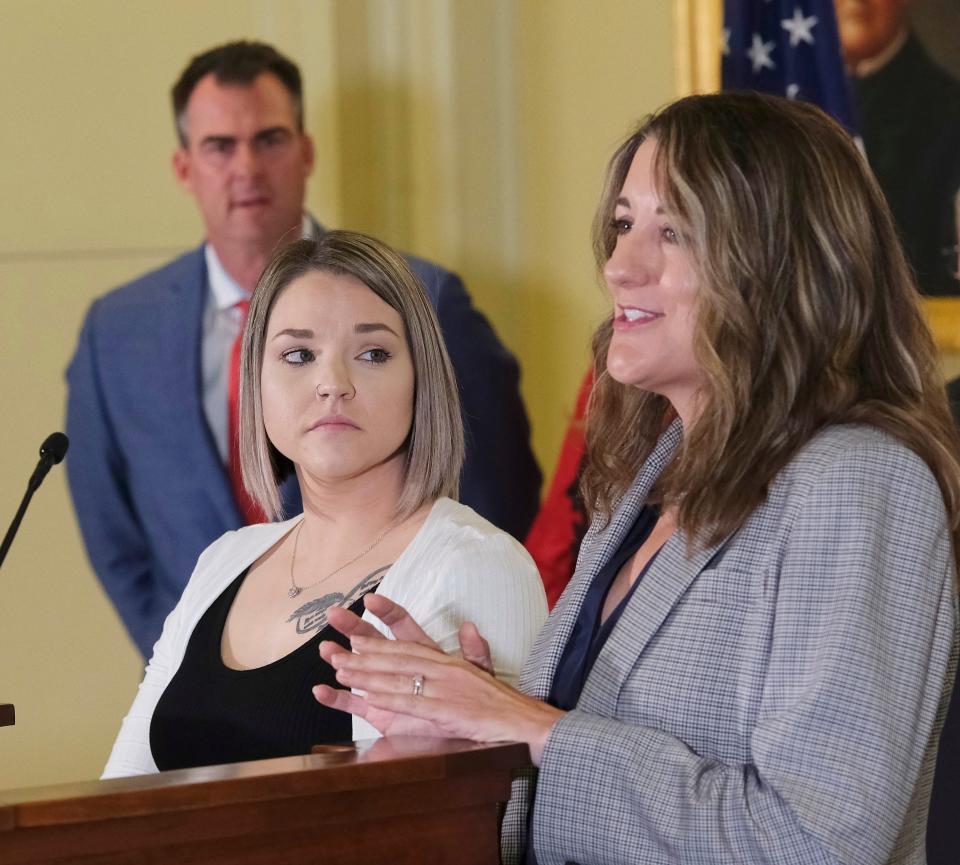 Juli Merciez, Chair of the Help Every Life and Parent task force, speaks while sharing the podium with Ciera Pollard, a beneficiary of the program, during a press conference to announce the expansion of SoonerCare for pregnancy and postpartum care at the Oklahoma Capitol Monday, March 27, 2023