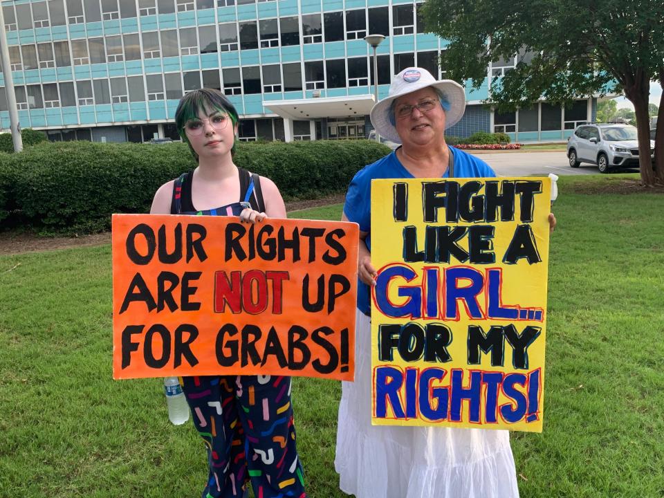 Marchers with signs at the March for Women's Reproductive Rights.