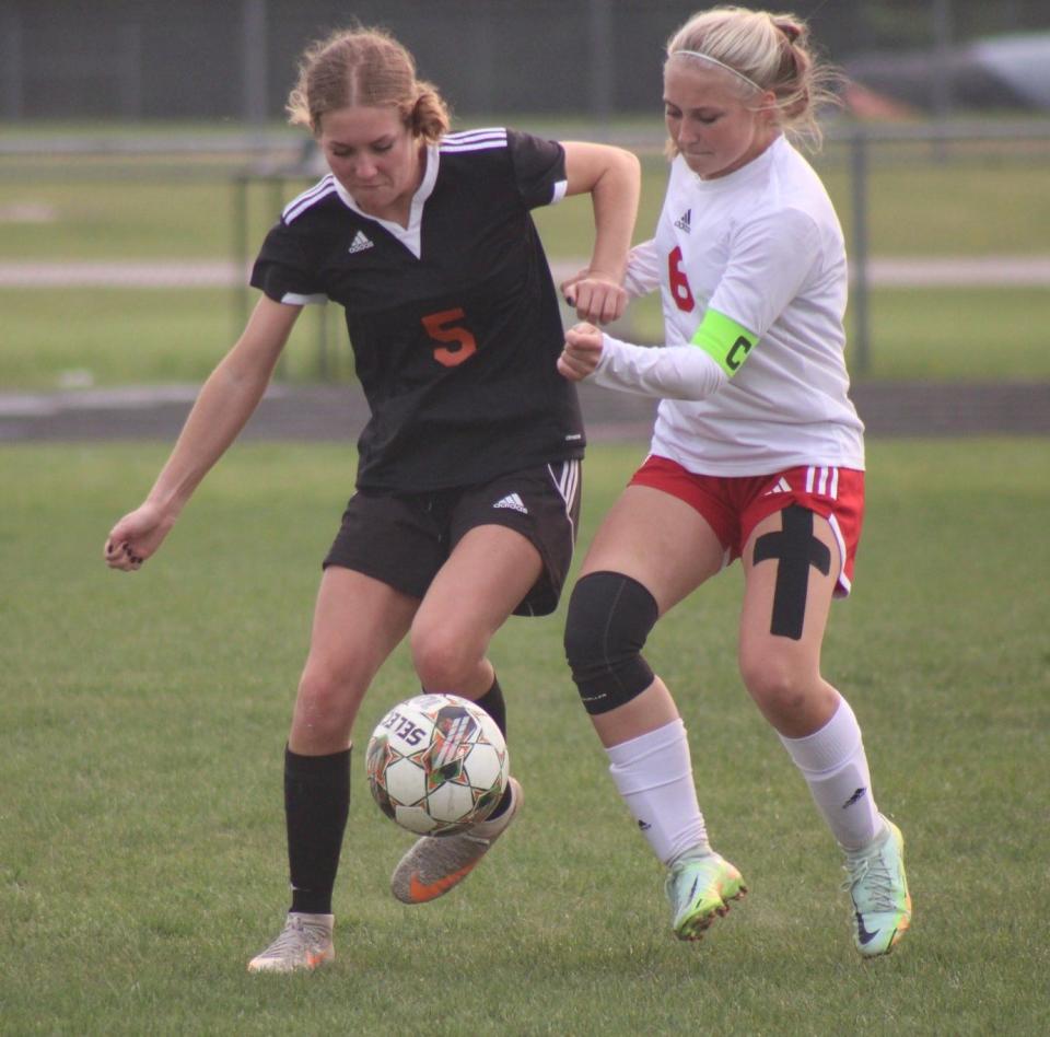 Senior Autumn Gingrich (left) is back for the defending Northern Michigan Soccer League girls champion Cheboygan Chiefs this spring.