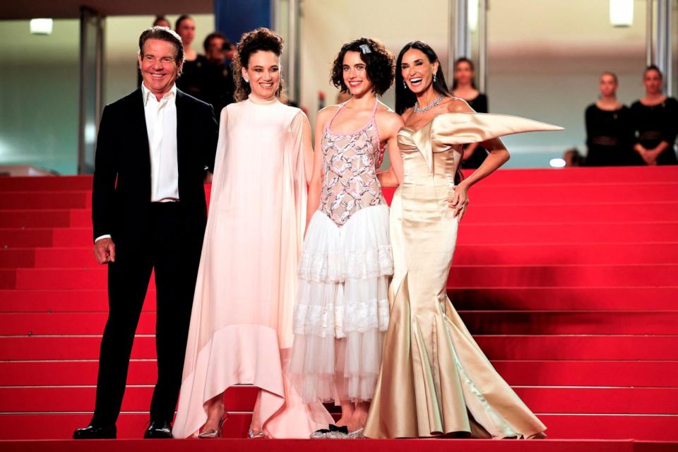 PHOTO: (From L) US actor Dennis Quaid, French director Coralie Fargeat, US actress Margaret Qualley and US actress Demi Moore arrive for the screening of the film 'The Substance' at the 77th edition of the Cannes Film Festival on May 19, 2024.  (Valery Hache/AFP via Getty Images)