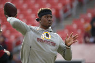 FILE - In this Dec. 22, 2019, file photo, Washington Redskins quarterback Dwayne Haskins works out prior to an NFL football game against the New York Giants, in Landover, Md. A new name must still be selected for the Washington Redskins football team, one of the oldest and most storied teams in the National Football League, and it was unclear how soon that will happen. But for now, arguably the most polarizing name in North American professional sports is gone at a time of reckoning over racial injustice, iconography and racism in the U.S. (AP Photo/Alex Brandon, File)