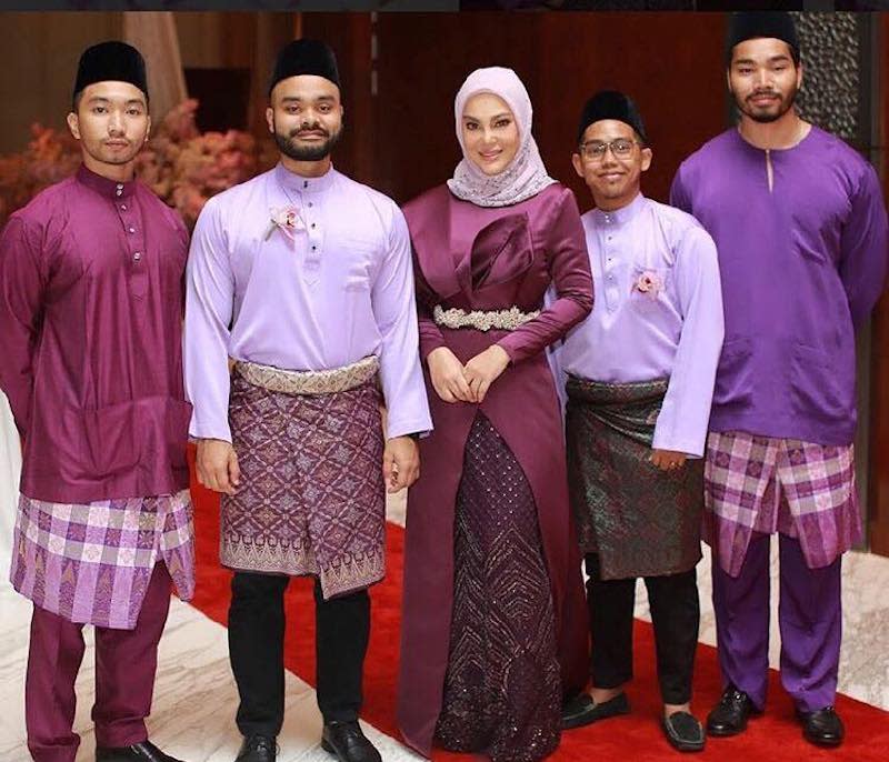 Umie with her two adopted sons and two stepsons. — Picture courtesy ofInstagram/@umieaida9