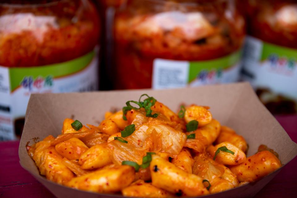 A view of the Kimchi Rice Cake from Deme Kitchen during Taste of Cincinnati in Cincinnati, Saturday, May 28, 2022.