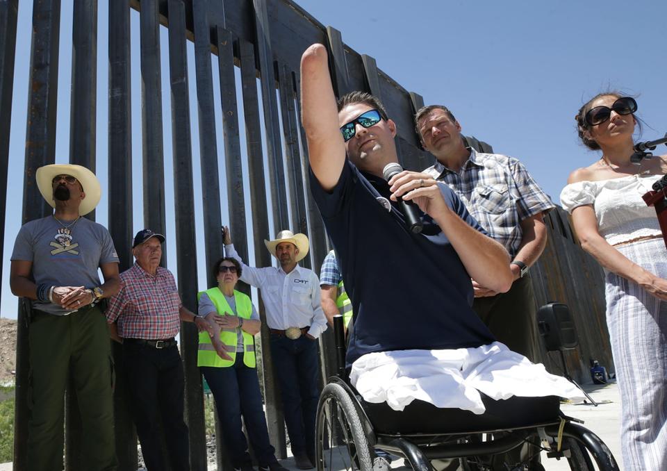 Brian Kolfage, founder of We Build the Wall, speaks at a news conference May 30, 2019, at the site of the group's private wall built in Sunland Park, New Mexico.
