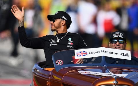 Lewis Hamilton of Great Britain and Mercedes GP waves to crowd on the drivers parade before the United States Formula One Grand Prix at Circuit of The Americas on October 21, 2018 in Austin, United States - Credit: getty images