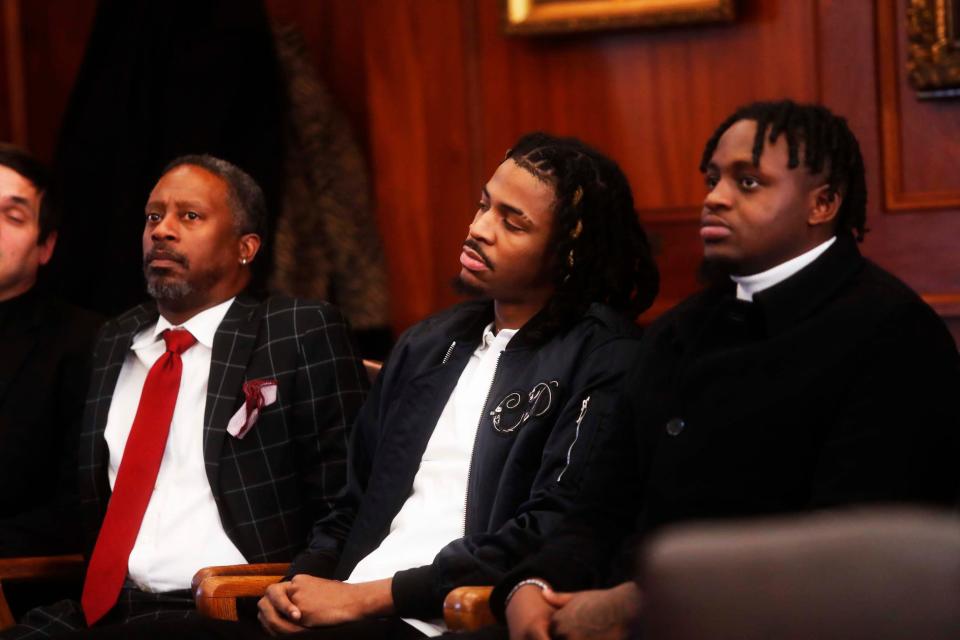 Ja Morant, left, listens to opening statements next to Davonte Pack, right, after he enters court for his hearing about his involvement in an incident at his home on Monday December 11, 2023 at Shelby County Circuit Court in Memphis,Tenn.