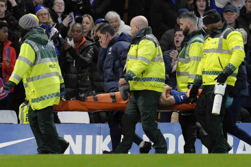 Injured Chelsea's Cesar Azpilicueta is taken away during the English Premier League soccer match between Chelsea and Southampton at the Stamford Bridge stadium in London, Saturday, Feb. 18, 2023. (AP Photo/Kirsty Wigglesworth)