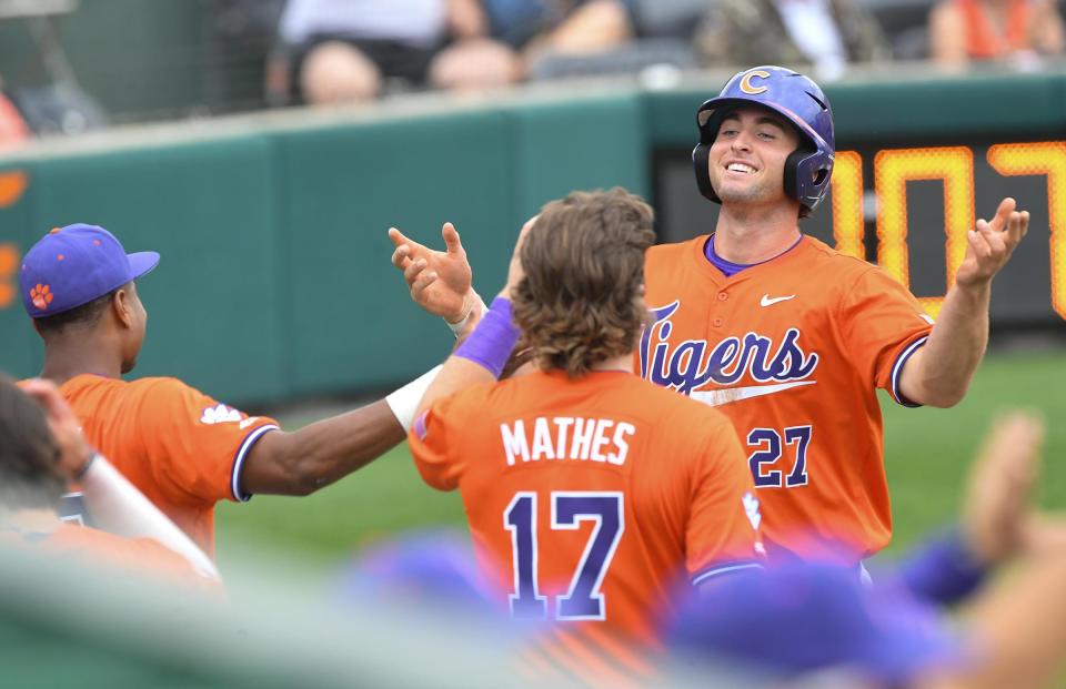 Clemson sophomore Tristan Bissetta (27) reacts scoring against Georgia Tech during the bottom of the second inning at Doug Kingsmore Stadium in Clemson Friday, May 3, 2024.