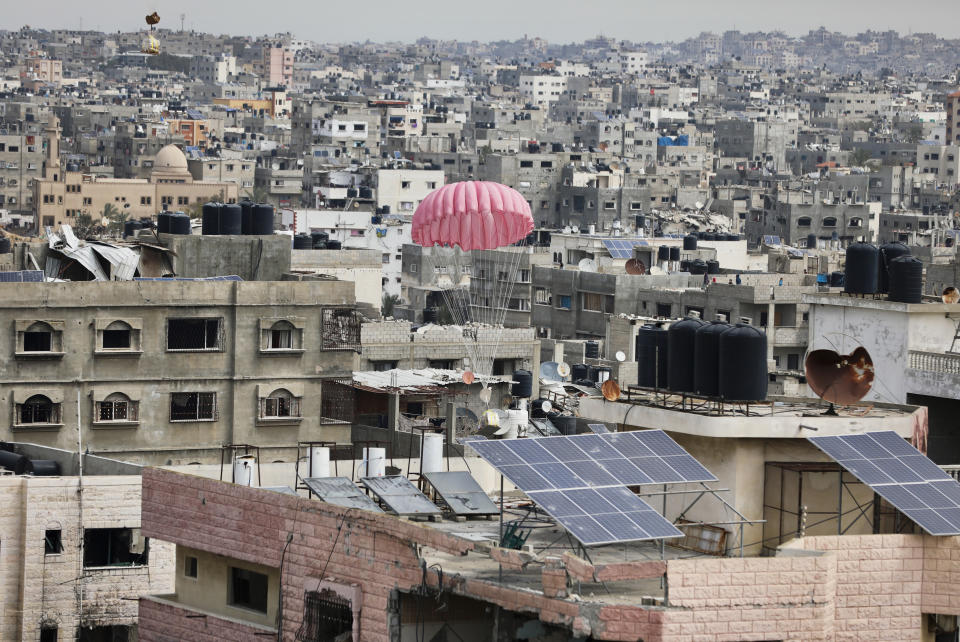 Humanitarian aid is airdropped to Palestinians in Gaza City, Gaza Strip, on Sunday, March 17, 2024. (AP Photo/Mohammed Hajjar)