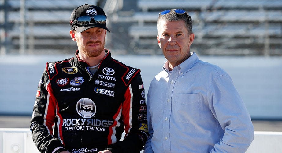 MARTINSVILLE, VA - OCTOBER 30: Jeb Burton, driver of the #23 Rocky Ridge/Estes Toyota, and his father Ward Burton stand on the grid during qualifying for the NASCAR Sprint Cup Series Goody\