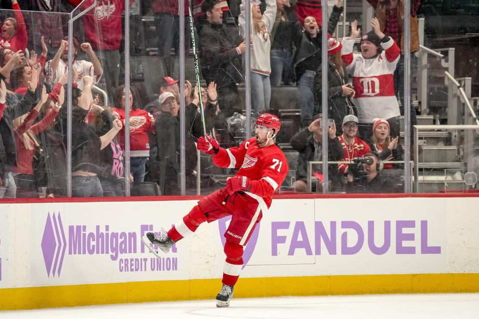 Dylan Larkin of the Detroit Red Wings reacts after scoring during the shootout and winning the game against the Arizona Coyotes at Little Caesars Arena in Detroit on Friday, Nov. 25, 2022.