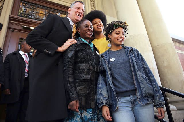 <p>Spencer Platt/Getty Images</p> Bill de Blasio and Chirlane McCray with their kids in Brooklyn, New York, on Nov. 5, 2013