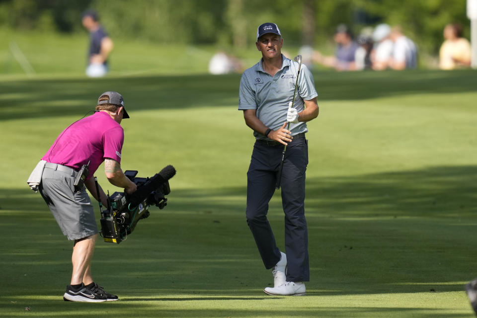 Brendon Todd watches his fairway shot on the 18th green during the third round of the John Deere Classic golf tournament, Saturday, July 8, 2023, at TPC Deere Run in Silvis, Ill. (AP Photo/Charlie Neibergall)