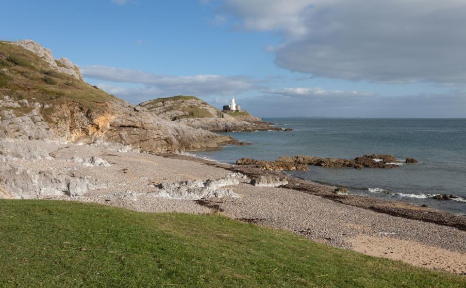 <p>Said to be a favourite spot of Catherine Zeta Jones, who owns a home overlooking the Mumbles' lighthouse with husband Michael Douglas, Bracelet Bay is one of Wales' most breathtaking beaches. There's a rocky shore, rock pools, a cave and a fossilised coral reef to explore while here. The beach boasts Blue Flag status and a seaside award – and is said to be where you can find some of the tastiest ice cream in the country. </p><p><strong>Where to stay: </strong>Sea Mist Lodge, just a few minutes' walk away in Limeslade Bay, is a two-bedroom chalet with a hot tub, modern kitchen and enough space for four guests to base themselves during a seaside escape.</p><p><a class="link " href="https://airbnb.pvxt.net/Ryq1aR" rel="nofollow noopener" target="_blank" data-ylk="slk:SEE INSIDE;elm:context_link;itc:0;sec:content-canvas">SEE INSIDE</a></p>