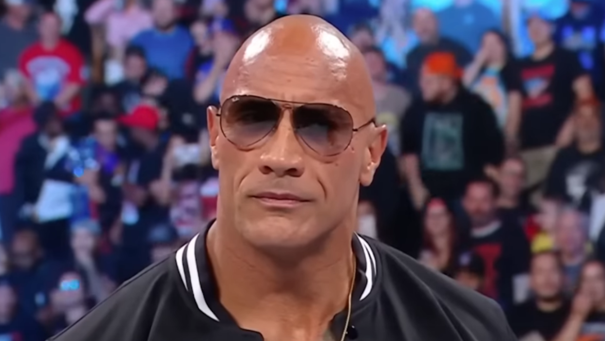  The Rock in sunglasses returning to WWE Smackdown. 