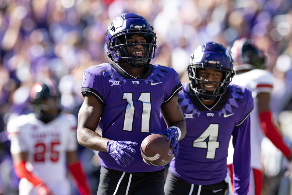 FORT WORTH, TX - NOVEMBER 05: TCU Horned Frogs wide receiver Derius Davis (#11) celebrates after scoring a touchdown during the college football game between the Texas Tech Red Raiders and TCU Horned Frogs on November 05, 2022 at Amon G. Carter Stadium in Fort Worth, TX.  (Photo by Matthew Visinsky/Icon Sportswire via Getty Images)