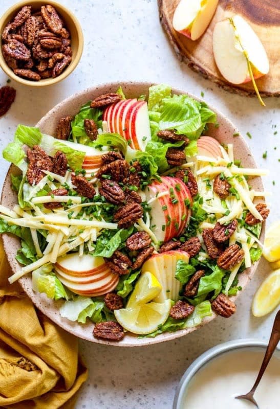 <p>Two Peas and Their Pod</p><p>This apple pecan salad with creamy lemon dressing is a fall favorite and always a hit at potlucks, Thanksgiving and dinner parties!</p><p><strong>Get the recipe: <a href="https://www.twopeasandtheirpod.com/apple-pecan-salad-with-creamy-lemon-dressing/" rel="nofollow noopener" target="_blank" data-ylk="slk:Apple Pecan Salad with Creamy Lemon Dressing;elm:context_link;itc:0;sec:content-canvas" class="link ">Apple Pecan Salad with Creamy Lemon Dressing</a></strong></p>