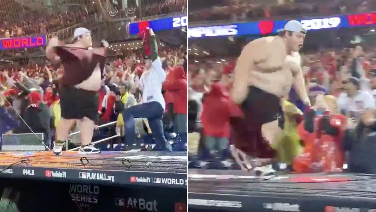 Nationals fan rips off shirt, slides across dugout after Series win