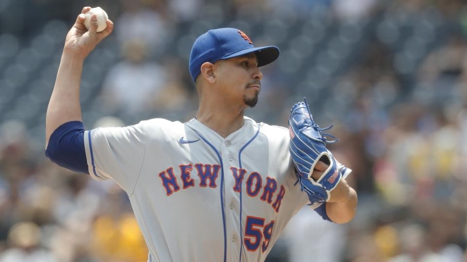 June 11, 2023;  Pittsburgh, Pennsylvania, USA;  New York Mets starting pitcher Carlos Carrasco (59) delivers a pitch against the Pittsburgh Pirates in the first inning at PNC Park.