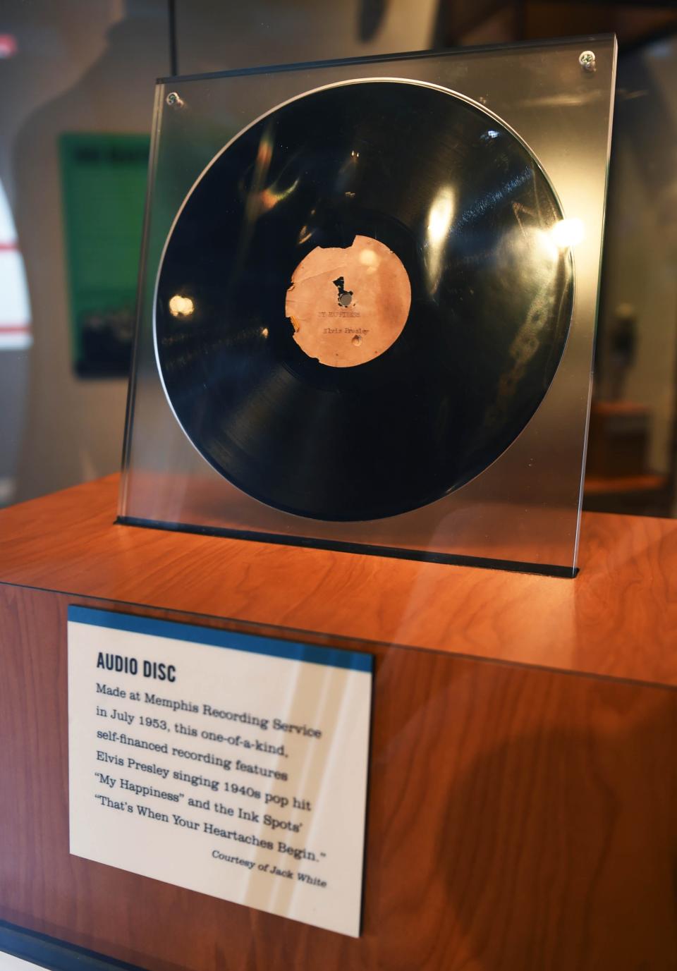 The Sam Phillips exhibit at the Country Music Hall of Fame features an audio disc recorded at Memphis Recording Service in July 1953 that features Elvis Presley singing 1940s pop hit "My Happiness."