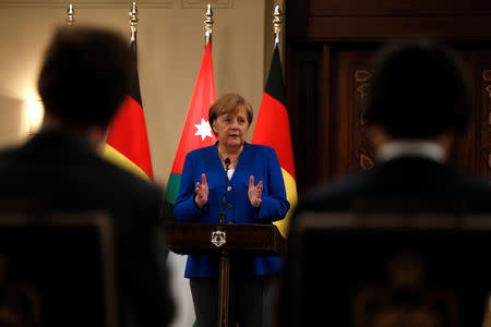 German Chancellor Angela Merkel speaks during a news conference at the Royal Palace in Amman, Jordan June 21, 2018. REUTERS/Muhammad Hamed