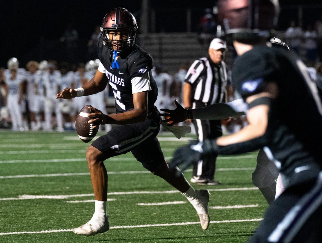 Lipscomb's Deuce Knight (2) looks upfield against IMG at Lipscomb's Reese Smith Football Field in Nashville, Tenn., Friday night, Aug. 18, 2023. IMG went on to win the game 35-10.