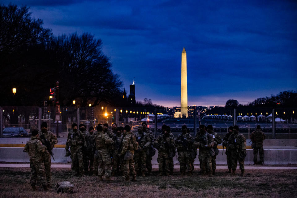 Soldiers from Bravo Company, 1st Battalion, 116th Infantry Brigade Combat Team, Virginia National Guard stand watch on the National Mall on January 17.