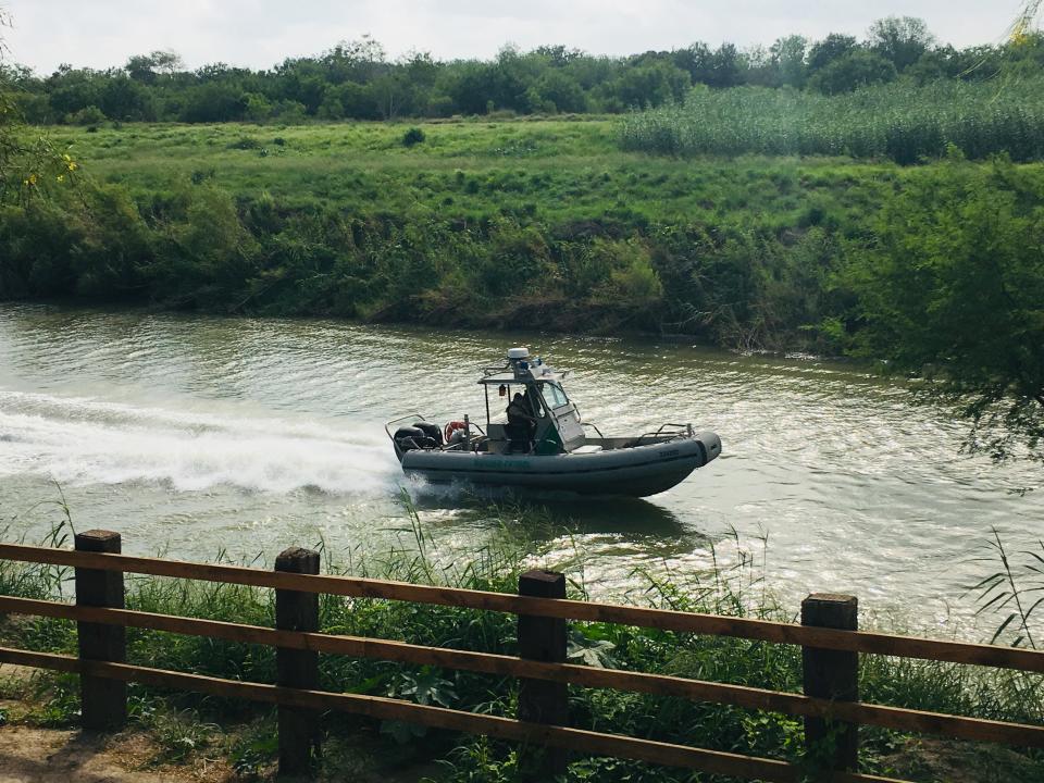 A U.S. Border Patrol boat navigates the Rio Grande near where the bodies of Salvadoran migrant Oscar Alberto Martínez Ramírez and his nearly 2-year-old daughter Valeria were found, in Matamoros, Mexico, Monday, June 24, 2019, after they drowned trying to cross the river to Brownsville, Texas. Martinez' wife, Tania told Mexican authorities she watched her husband and child disappear in the strong current. (AP Photo/Julia Le Duc)