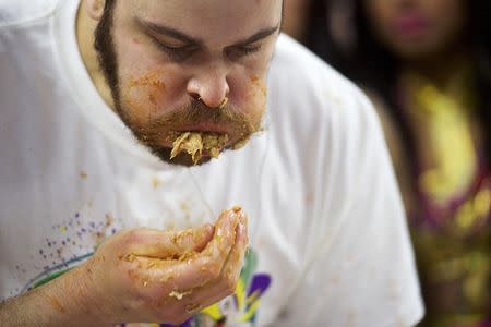 Patrick "Deep Dish" Bertoletti competes in the 23rd annual Wing Bowl at the Wells Fargo Center in Philadelphia, Pennsylvania January 30, 2015. REUTERS/Mark Makela