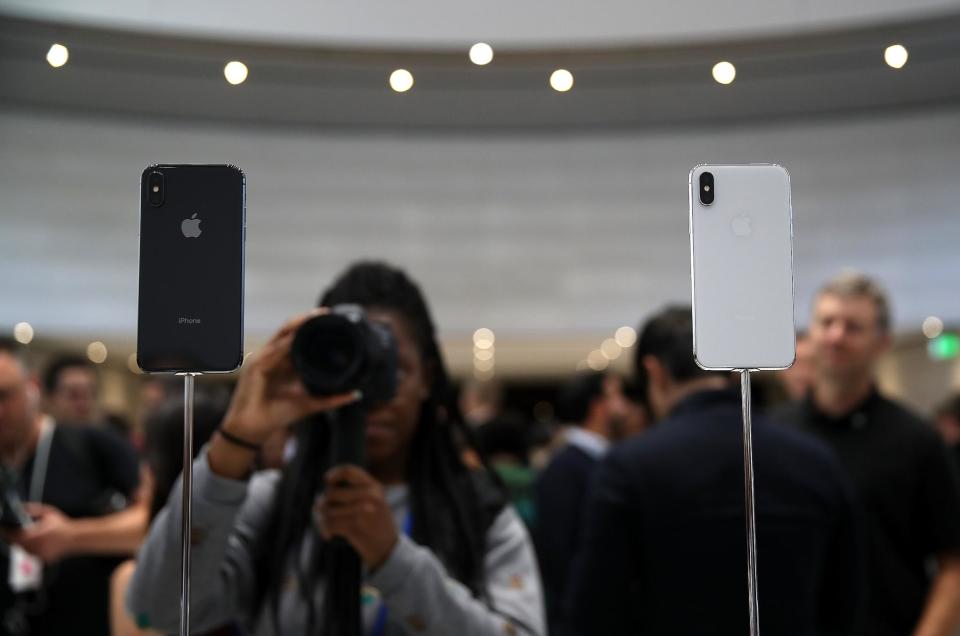 The two new iPhone Xes is displayed during an Apple special event at the Steve Jobs Theatre on the Apple Park campus: Photo by Justin Sullivan/Getty Images