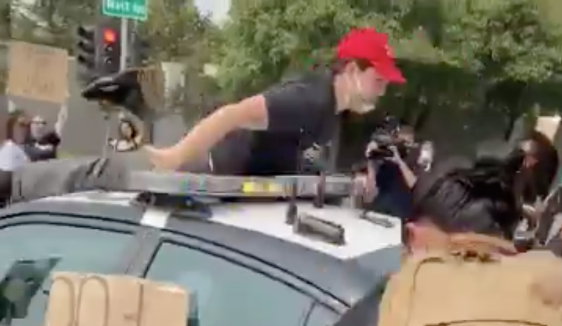 An anti-Trump protester was injured in Sacramento after falling from the roof of a highway patrol vehicle onto which he had climbed (CBS 13)