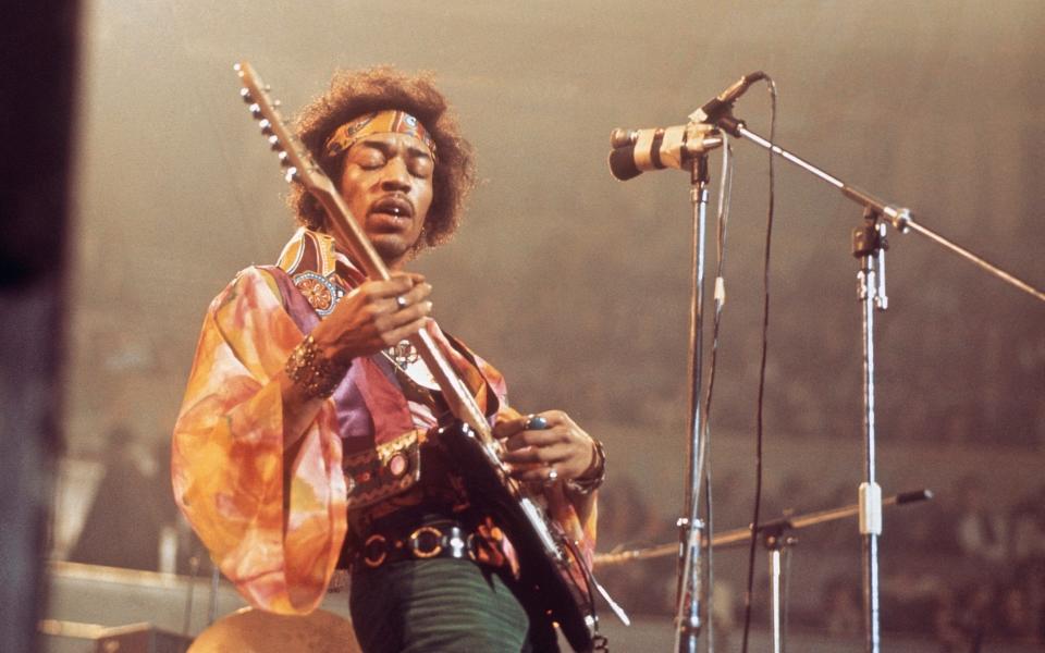 Jimi Hendrix with his Stratocaster guitar at the Royal Albert Hall in 1969 - Redferns