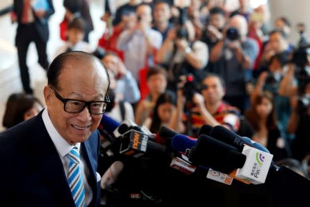 Hong Kong tycoon Li Ka-shing, chairman of CK Hutchison Holdings, meets journalists as he formally retires in Hong Kong