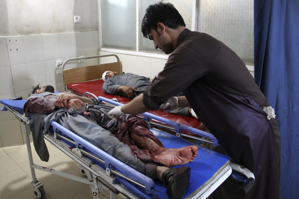 A wounded man receives treatment at a hospital after a suicide car bomb and multiple gunmen attack in the city of Jalalabad, east of Kabul, Afghanistan, Sunday, Aug. 2, 2020. A suicide car bomb and multiple gunmen attacked a prison in eastern Afghanistan on Sunday, Afghan officials said, killing at least one person and injuring dozens. (AP Photo)