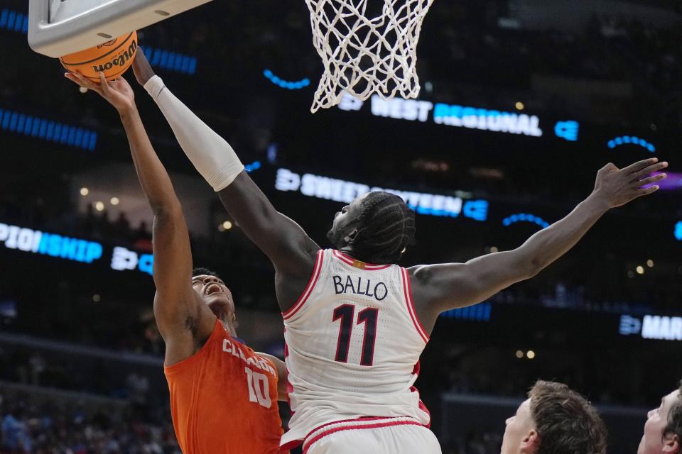 Clemson Tigers forward RJ Godfrey (10) shoots against Arizona Wildcats center Oumar Ballo (11) in the second half in the semifinals of the West Regional of the 2024 NCAA Tournament at Crypto.com Arena in Los Angeles on March 28, 2024.