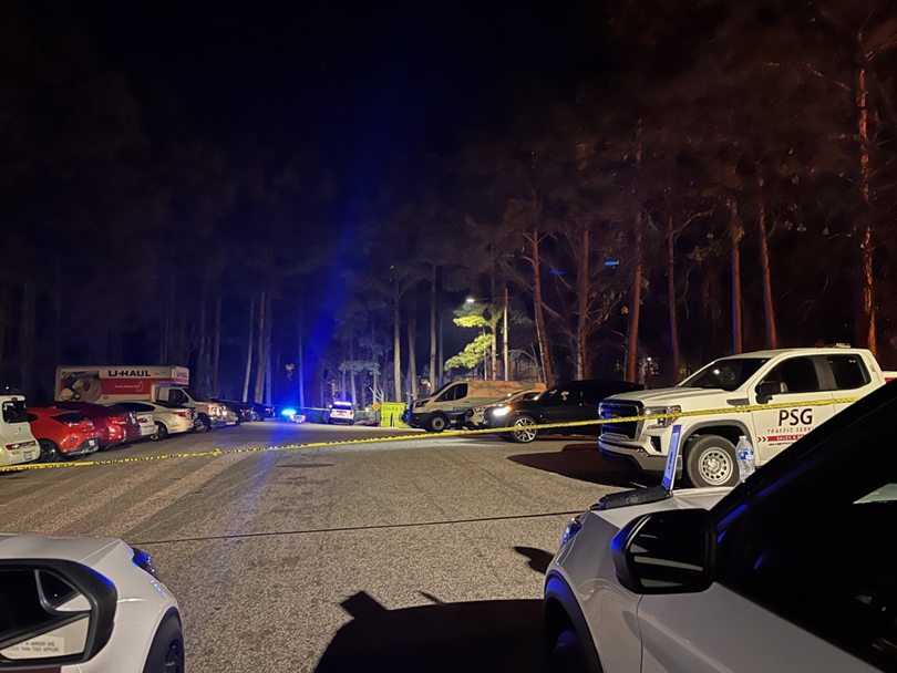 The Fayetteville Police Department vehicles line Tamarack Drive where one man was killed during a shooting, Jan. 11, 2024.