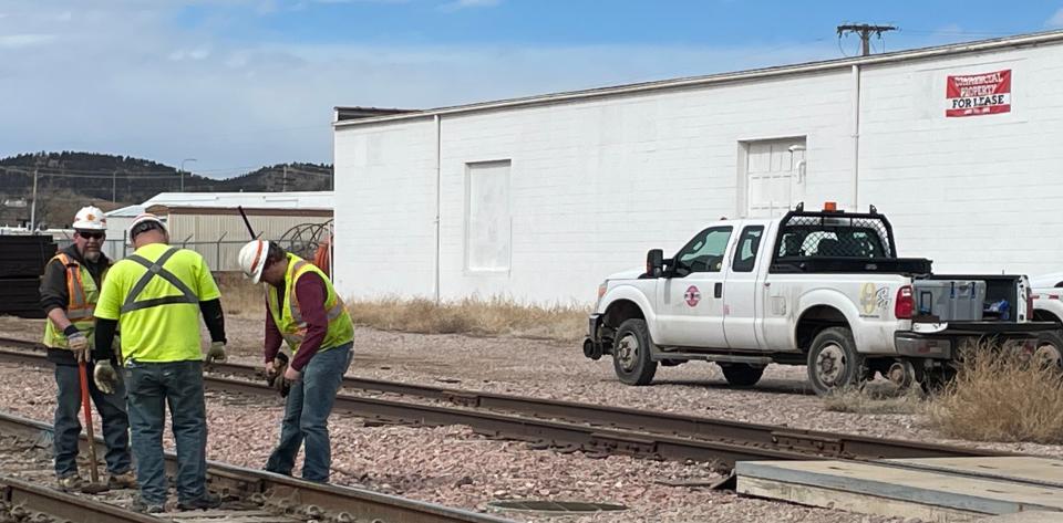 Workers from the Rapid City, Pierre & Eastern Railroad replaced a large bolt on a railroad line in downtown Rapid City in mid-March.