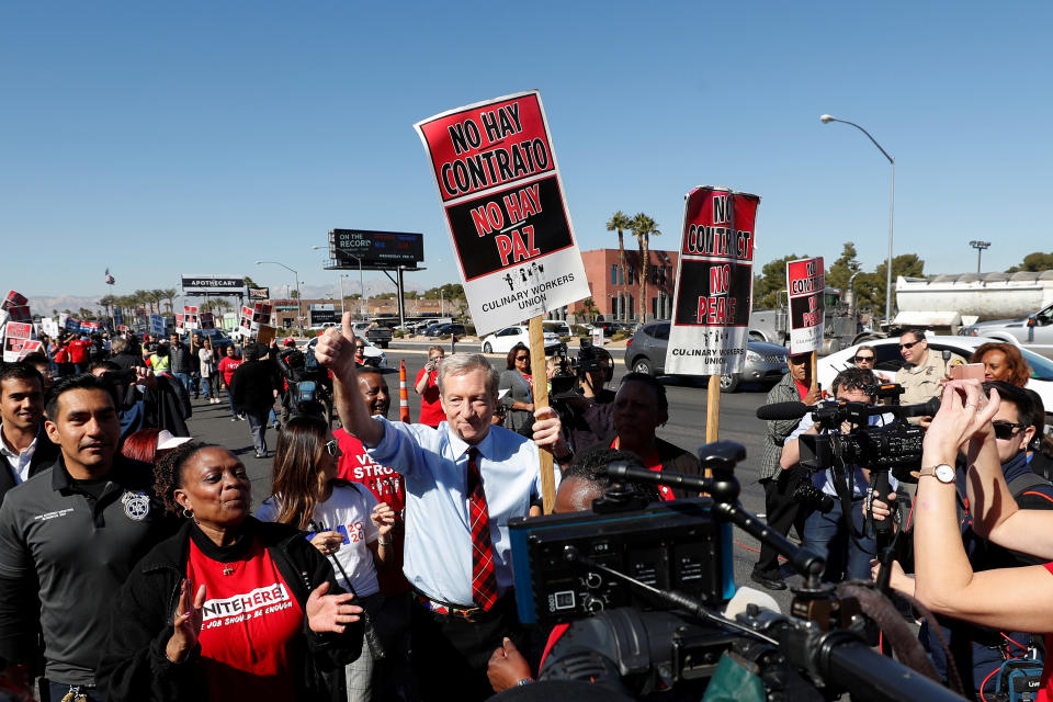 Democratic presidential candidate Tom Steyer walks in a march with the Culinary Union's picket line outside the Palms Hotel in Las Vegas, Nevada, U.S., February 19, 2020.   REUTERS/Shannon Stapleton