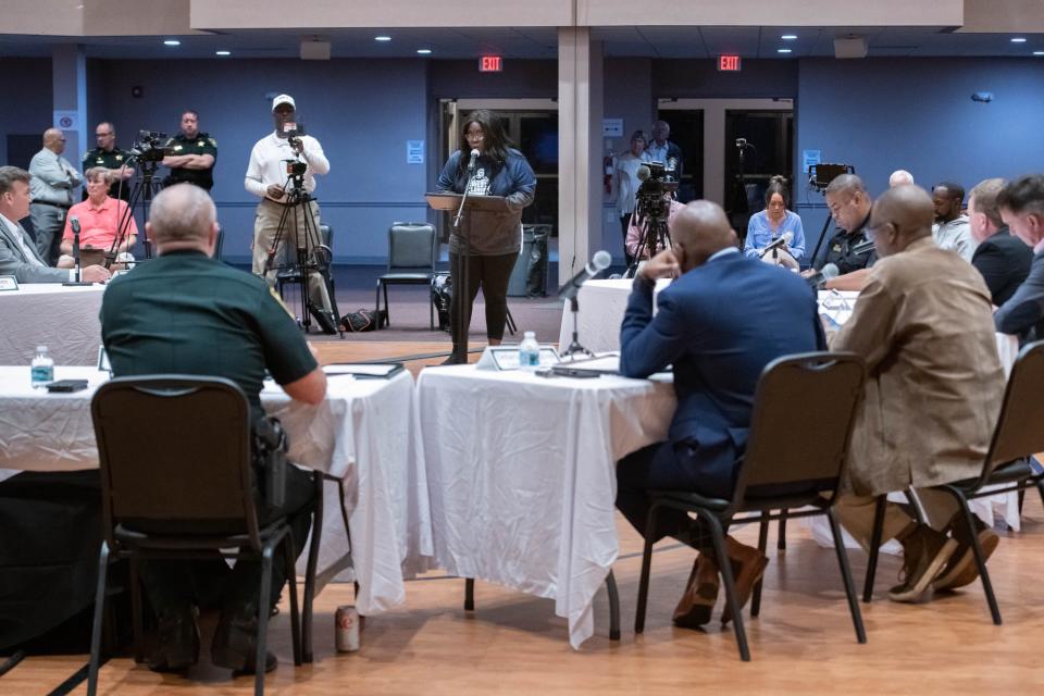 T. Nettles, top center, speaks during the public comments session of an Escambia County Gun Violence Round Table hosted by Sheriff Chip Simmons at the Brownsville Community Center in Pensacola on Wednesday, Jan. 18, 2023.