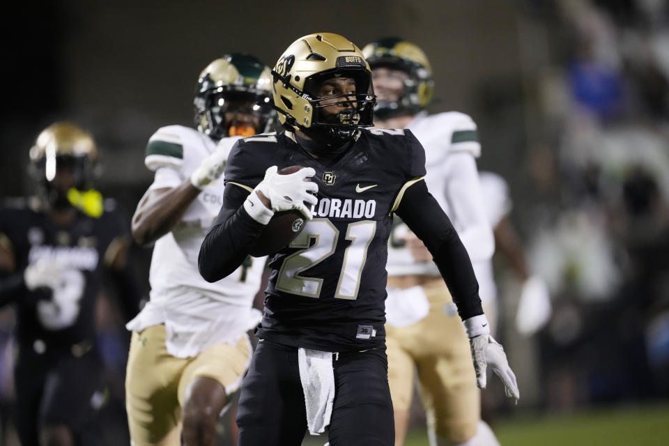 Colorado safety Shilo Sanders returns an interception for a touchdown in the first half of an NCAA college football game against Colorado State, Saturday, Sept. 16, 2023, in Boulder, Colo. (AP Photo/David Zalubowski)
