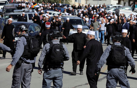 Israeli police try to disperese Druze protesters outside a polling station in Majdal Shams, October 30, 2018. REUTERS/Ammar Awad