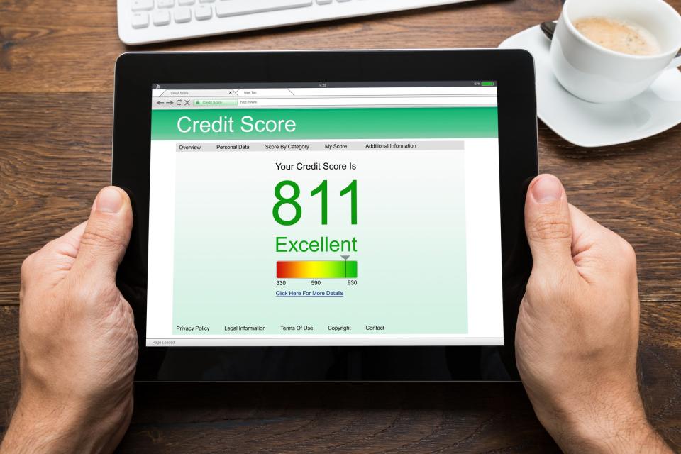 Tablet showing credit score of 811.