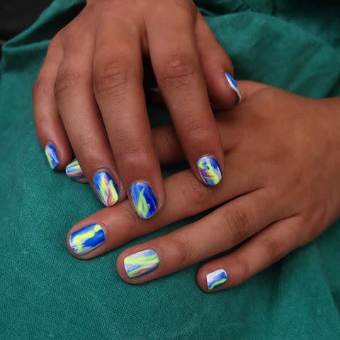 <p>Graffiti meets waves with this turquoise nail art. </p><p><a href="https://www.instagram.com/p/Bk3XuILlvyC/?utm_source=ig_embed&utm_campaign=loading" rel="nofollow noopener" target="_blank" data-ylk="slk:See the original post on Instagram;elm:context_link;itc:0;sec:content-canvas" class="link ">See the original post on Instagram</a></p>