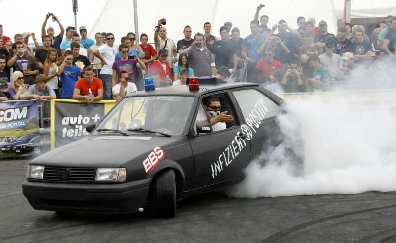 What environment? Fans of tuned-out VW GTIs converge on a lesser-known town of Austria every year in their thousands, but climate concerns are now putting an end to the event. Volkswagen has now stepped in with its own counterpart in Germany. Gert Eggenberger/APA/dpa