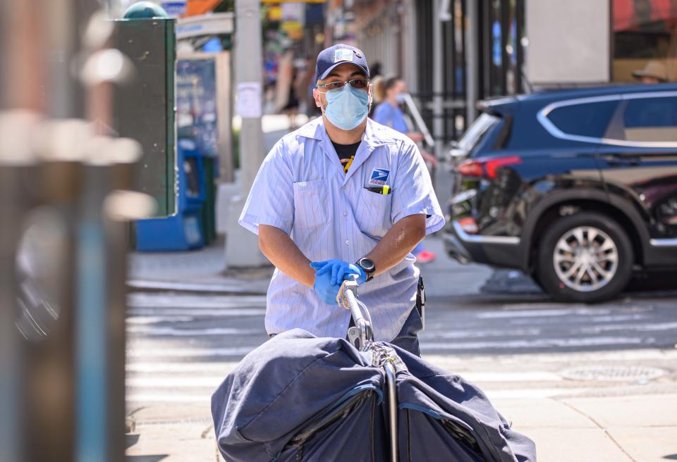 A United States Postal Service worker in Kips Bay, New York, August 18, 2020.