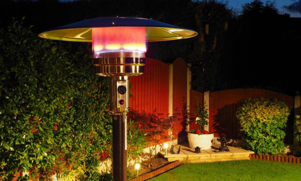 An outdoor gas heater in a garden