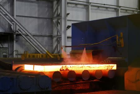 Steel is seen in the rolling mill following the recommissioning of the works by Liberty Steel Group at the Dalzell steel plant in Motherwell, Britain September 28, 2016. REUTERS/Russell Cheyne