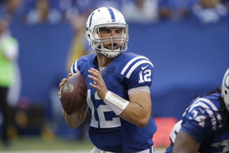 Indianapolis Colts quarterback Andrew Luck throws against the Tennessee Titans during the second half of an NFL football game in Indianapolis, Sunday, Sept. 28, 2014. (AP Photo/AJ Mast)